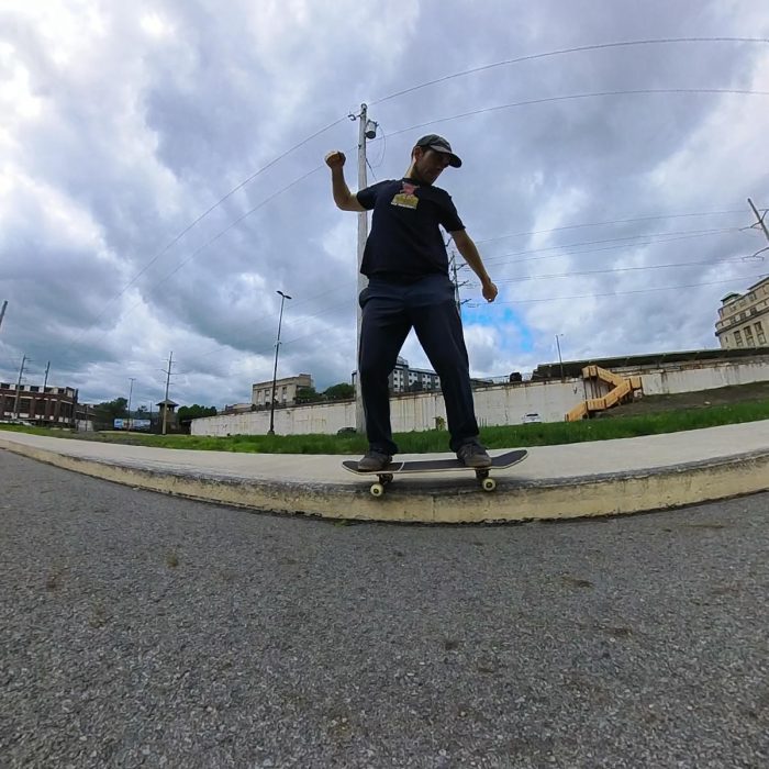 Backside 5050 on a curb with Slappy Trucks