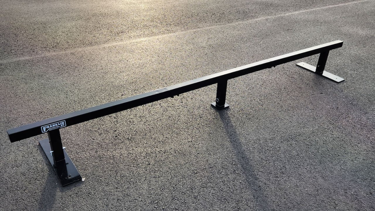 Franklin St Obstacles Nine Foot Flat Bar in Parking Lot