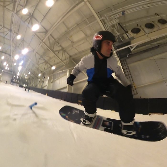 Never Summer Proto Type 3 Snowboard Review: Testing the Tech in the Park 9 Blasting off a pole jam