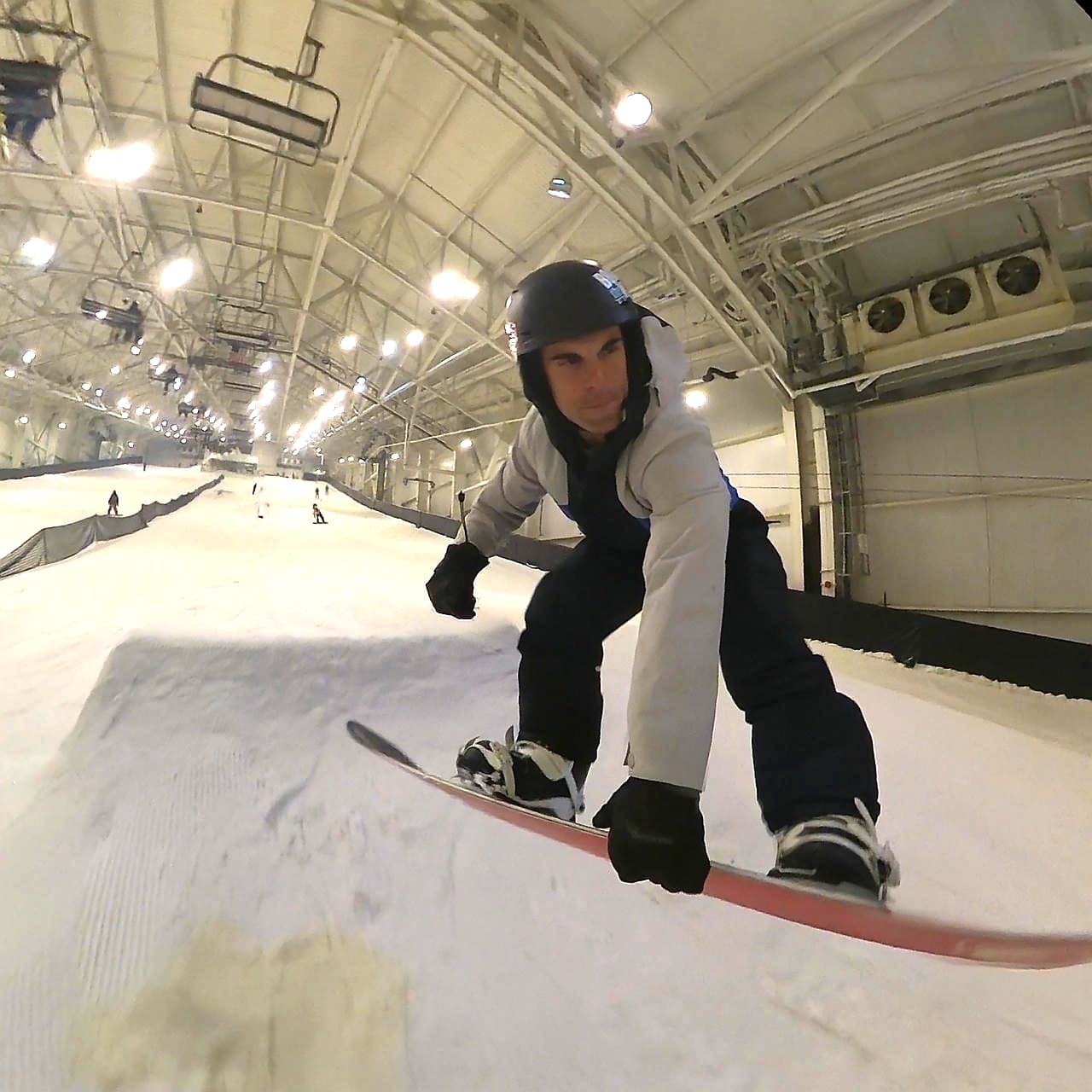 The 9 Dominant "Do-It-All" Snowboards for 2026: Field Tested to Prove Why Your Quiver is a Waste 5 Steve hitting a jump with the Never Summer Proto Type 3