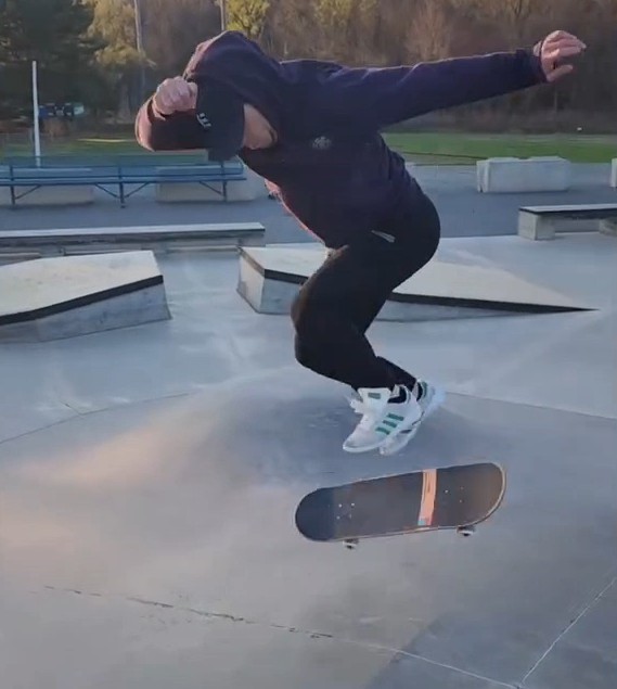 Steve doing a backside bigspin on OJ Hardline Elitewheels 99a 53mm on a skatepark pyramid's hip