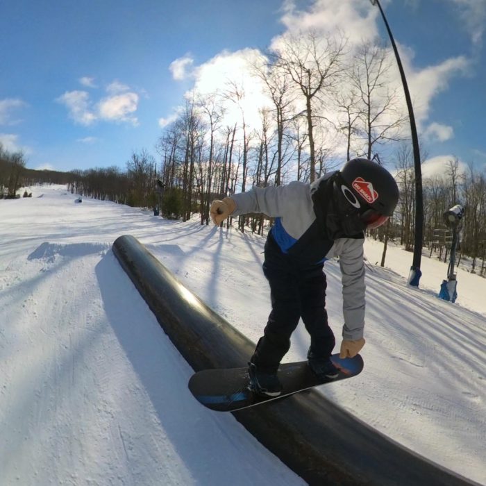 Steve Weber Backside boardsliding a park tube with the Never Summer Proto Swift DT 2027 snowboard