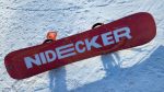 Nidecker Cheat Code resting on snow