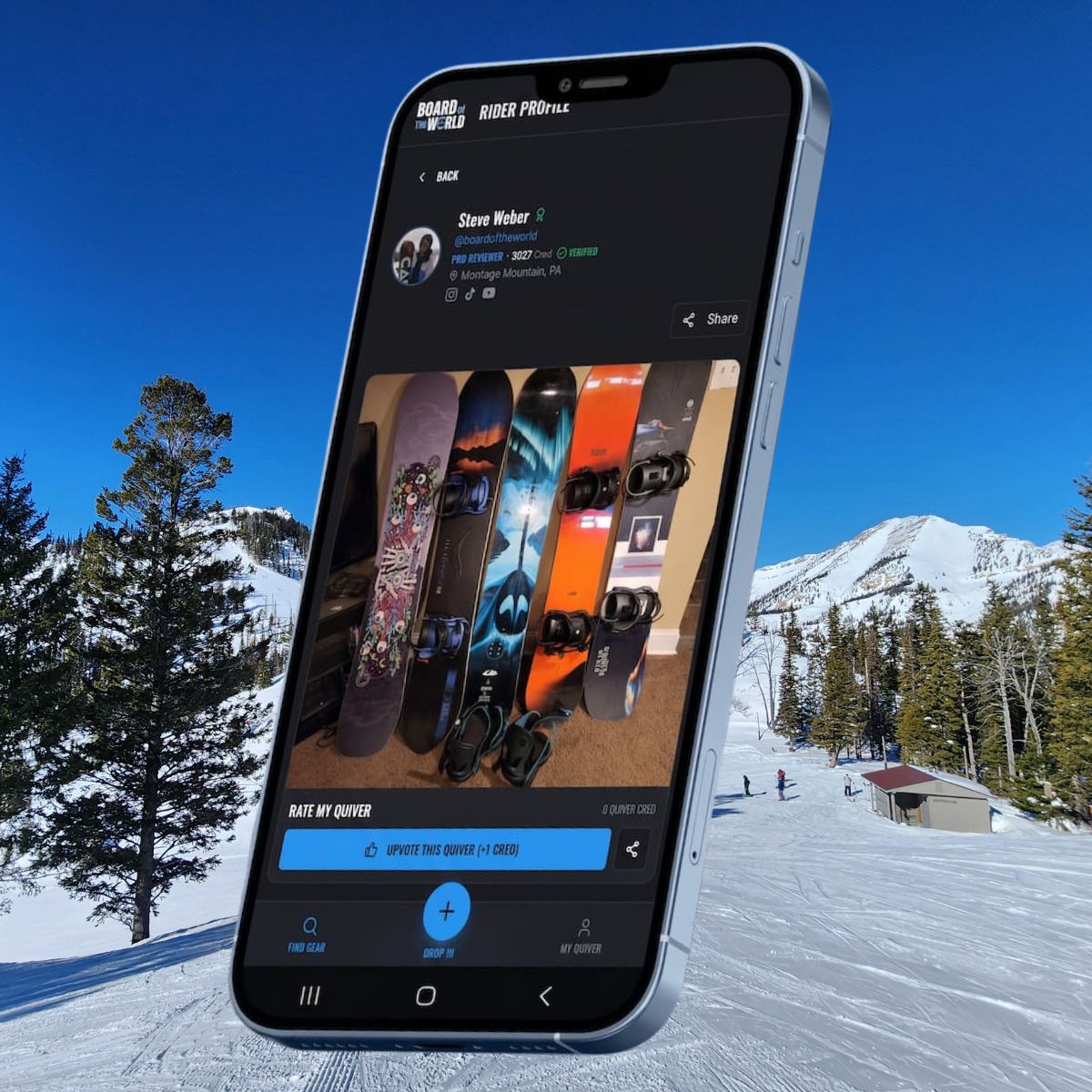 Board of the World Snowboard app shown on a phone on a snowy mountain