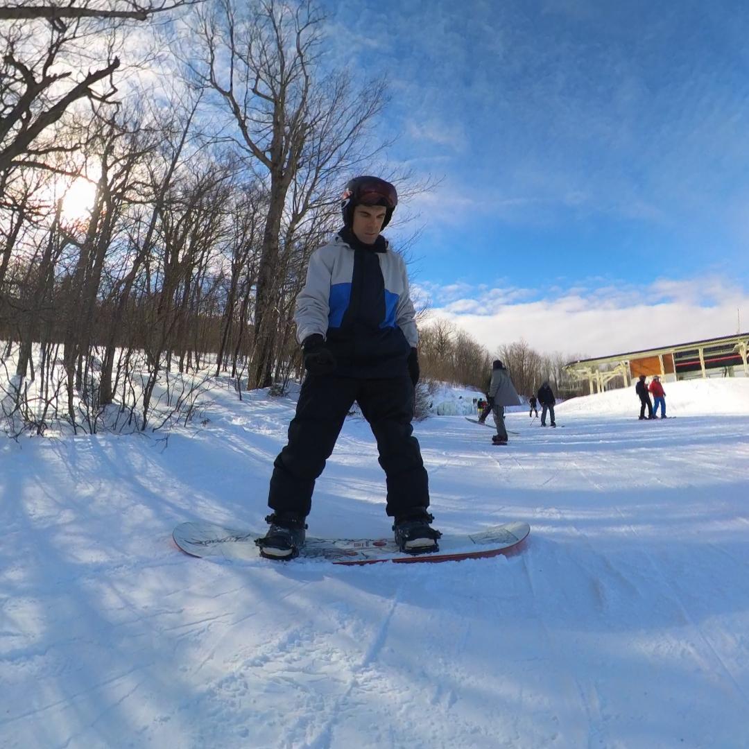 Torsional flex test twisting the Armada Beatnik across the waist, which stayed soft and made the board easy to steer with your ankles