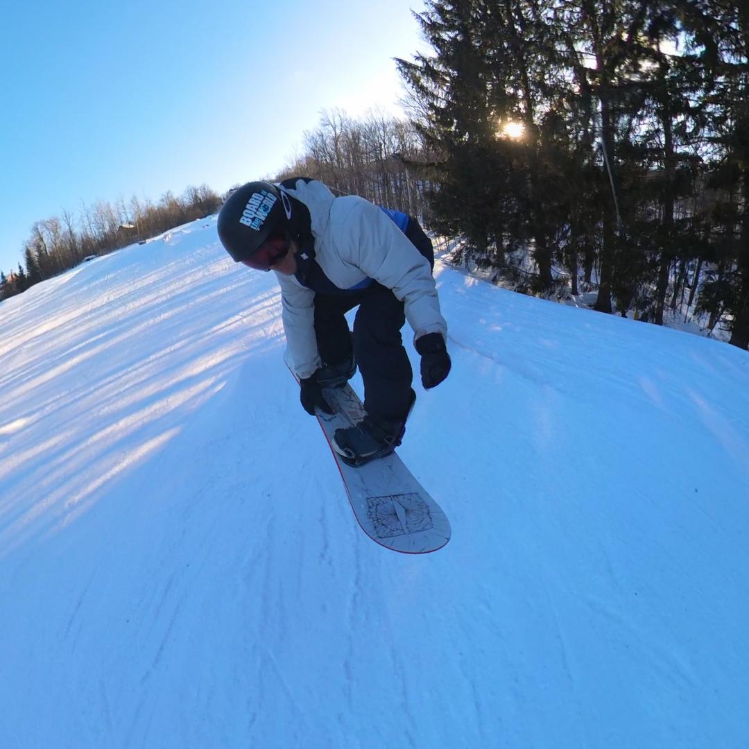 Indy grab off a medium jump on the Armada Beatnik 2027 at Stratton