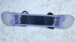 Rome Boneless 2026-2027 snowboard resting on snow with its base pointed up